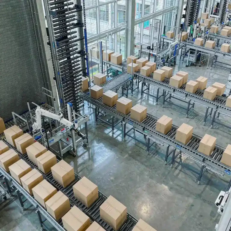 Warehouse conveyor system transporting cardboard boxes in distribution center