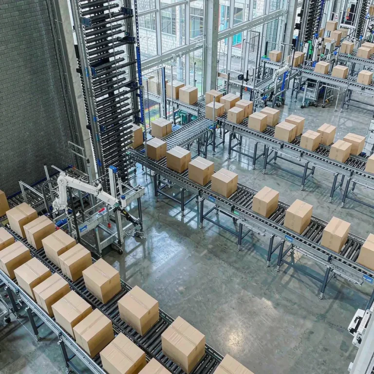 Warehouse conveyor system transporting cardboard boxes in distribution center