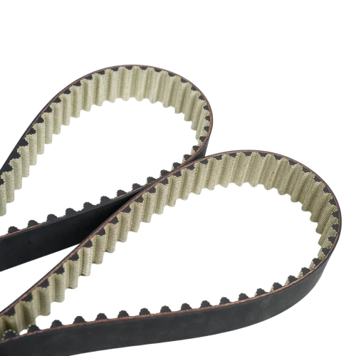 automotive timing belt with white PTFE tooth facing